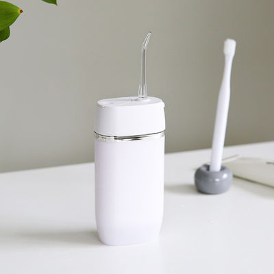 Mini Ipx7 165ml Water Tank Water Flosser Oral Irrigator With 2 Tips